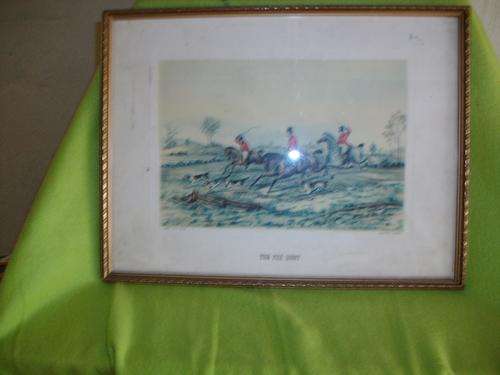 A old print of a fox hunt picture with gold plated frame