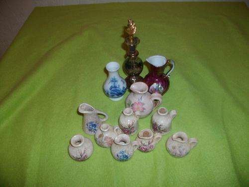 Collection of small pottery vases with nice perfume bottle