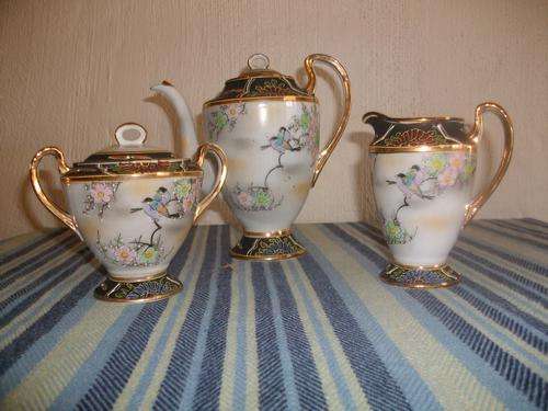 Lovely set of tea pot creamer and sugar bowl
