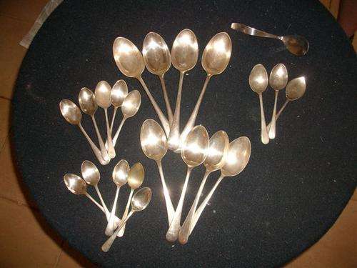 collection of sliver plated spoons