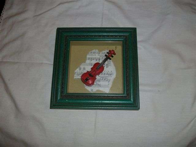 Lovely small violin framed