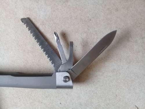 Multi tool with leather pouch, 9 functions