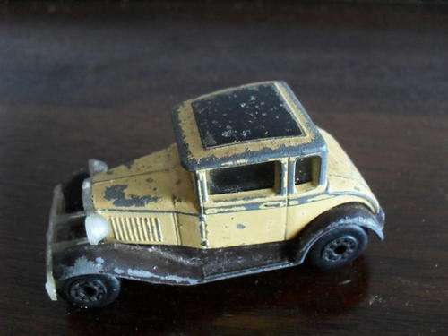 A WELL LOVED AND PLAYED WITH MATCHBOX  MODEL A FORD   1979  CAR - made in MACAU