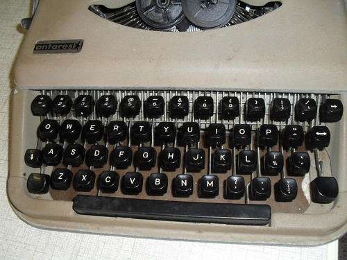 AN OLD  ANTAREST PORTABLE MANUAL TYPEWRITER -STILL WORKING