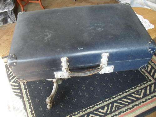 A STRONG VINTAGE NAVY BLUE REVELATION LUGGAGE SUITCASE -with adjustable latch