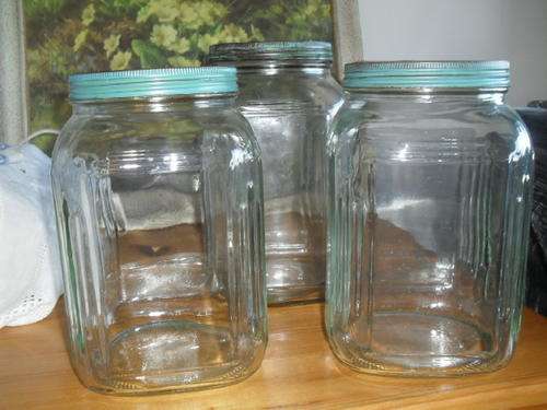 3x  VINTAGE GLASS COUNTER SWEET BOTTLES with GREEN METAL LIDS -1x 25cm 2x 22cm