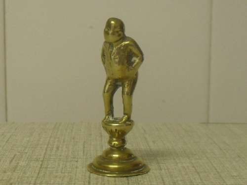 (JE) A BRASS  PIPE TAMPER - CHARLES DICKENS CHARACTER - 5.5cm tall