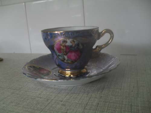 (or)  GORGEOUS VERSAILLES ROMANTIC SCENE CUP AND SAUCER DUO. - saucer 12cm arcoss cup 5.5cm tall