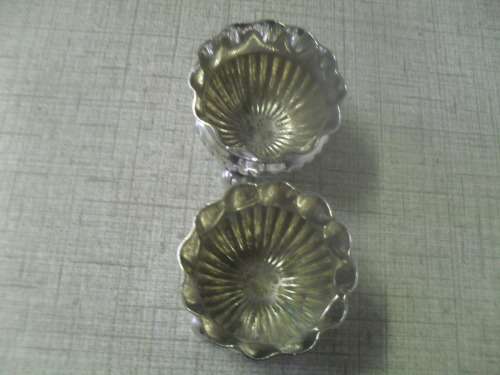 (DEr)  PAIR OF SILVER PLATED  FOOTED  MAPPIN and WEBB OPEN SALTS opening4cm, 3.5cm height incl feet.
