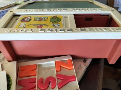 A VINTAGE COMPLETE FISHER PRICE SCHOOL DAYS DESK