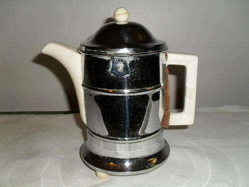 A Ceramic Coffee pot with a stainless steel and blanket cosy. -Made in England