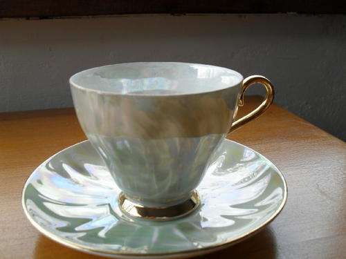 A beautiful elegant tea cup in lustreware colour - Princess redg.