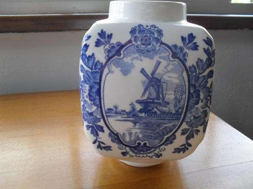 WHAT IS THIS? NO MARKINGS BLUE AND WHITE CONTAINER 2 OPENINGS