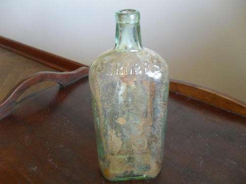 A VINTAGE SCUBB'S AMONIA BOTTLE