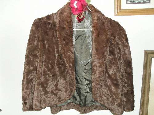 A VINTAGE FURNYL FAUX FUR  jacket with 3/4 sleeves.  FILNOMA REDG. Size 36
