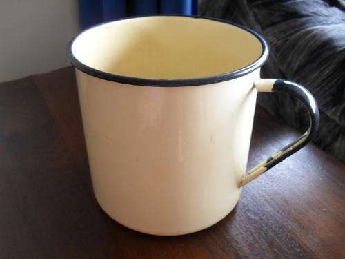 A  "HUGE" vintage ENAMEL MUG with black edging -no markings