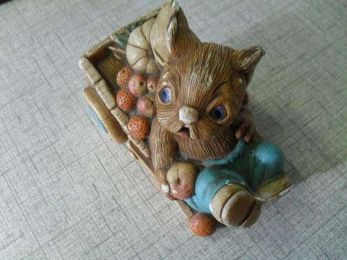 A PENDELFIN -BARROW BOY  made in ENGLAND. Hand painted -stone craft.