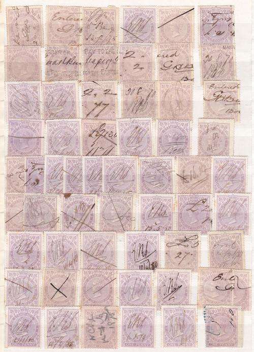 Cape of Good Hope Queen Victoria revenue stamps on album page.