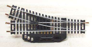 LIMA HO: #3050E RH Manual Turnout Track in good unboxed condition.