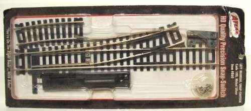 ATLAS HO: Left Manual Snap Switch Kit  in NEW Boxed condition.