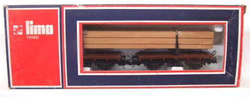 LIMA HO: RARE Twin Truck Transporter with Timber Load in good boxed condition (Italy)