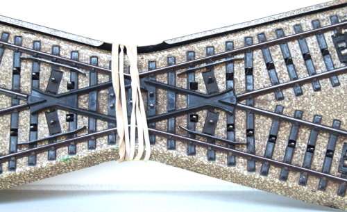 MARKLIN HO/OO: 2pc Vintage 3 Rail Cross Over Track in Fair un-boxed operational condition.(England)