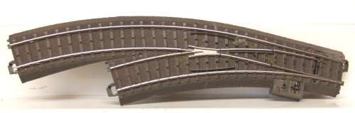MARKLIN HO: 3 Rail Metal/Plastic C-Type LH Point (#671) in very good un-boxed condition.(Germany)