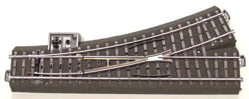 MARKLIN HO: 3 Rail Metal/Plastic C-Type LH Point (#611) in Like New un-boxed condition.(Germany)