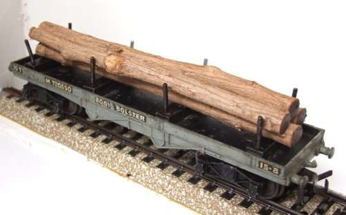 HORBY DIABLO OO/HO: Vintage 3rail Low Bed  wagon with Log load in good un-boxed condition (England)