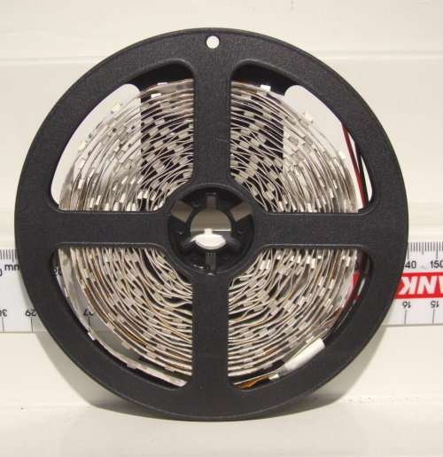 WHITE LED LIGHT HO: 3m Roll of bright 12V DC LED Adhesive Lights Strip in New Packaged condition.