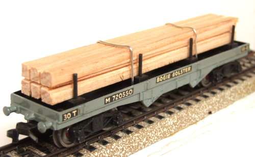 HORNBY DUBLO OO:  Vintage English Bogie Bolster Wagon with Wood Load in Good condition(England)