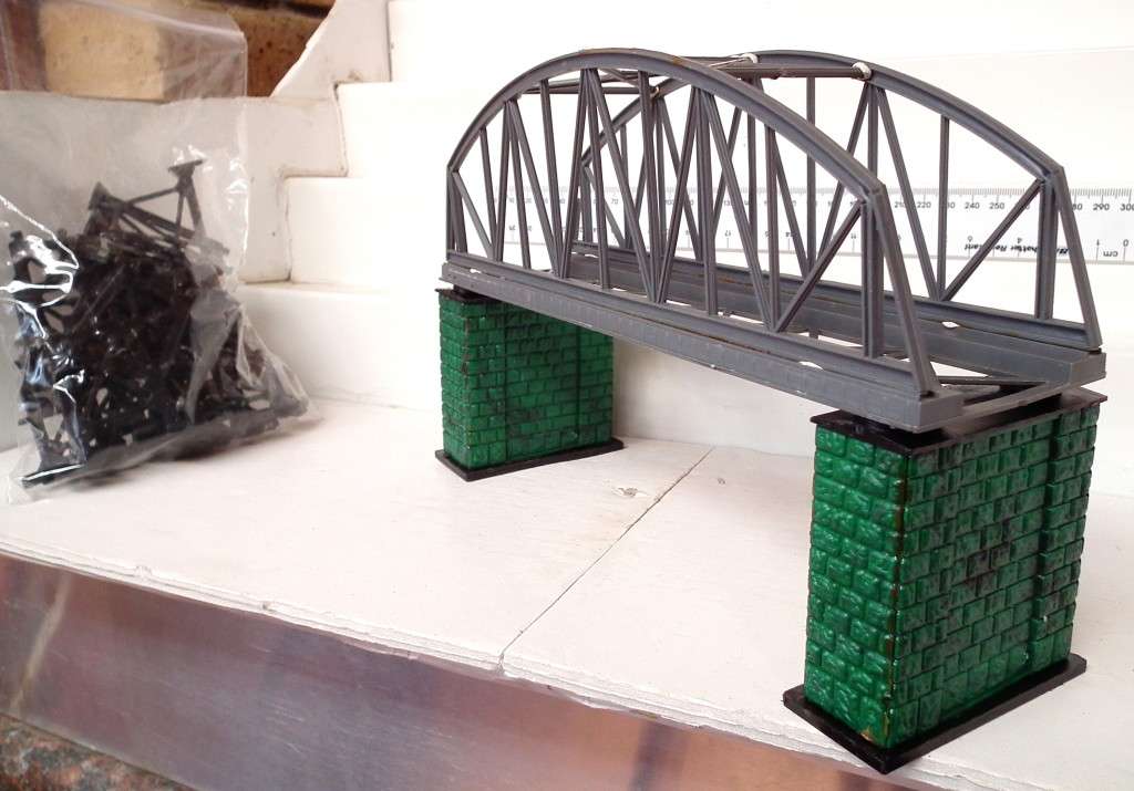 HELJAN HO:  Plastic Arch Bridge with Rock Pylons and Track Supports  in Fair Used Condition.