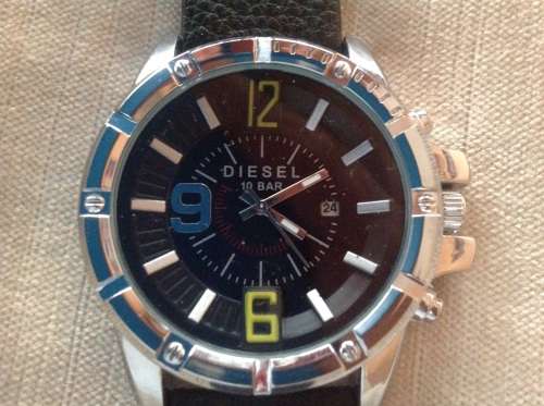 (ABSOLUTELY GORGEOUS!!!) DIESEL TOUGH GUY watch, with genuine leather strap (Red hot!!)