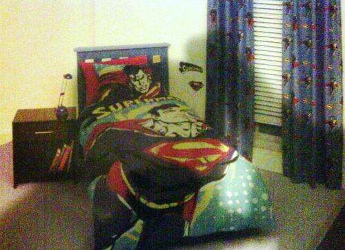 Superman single duvet set! Bid and win a free matching curtain! Bedtime wont be a problem anymore :)