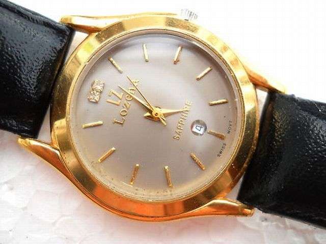 23 Kt GOLD 100% SWISS LOZENA UNISEX QUARTZ SWISS MOVEMENT (Display item)