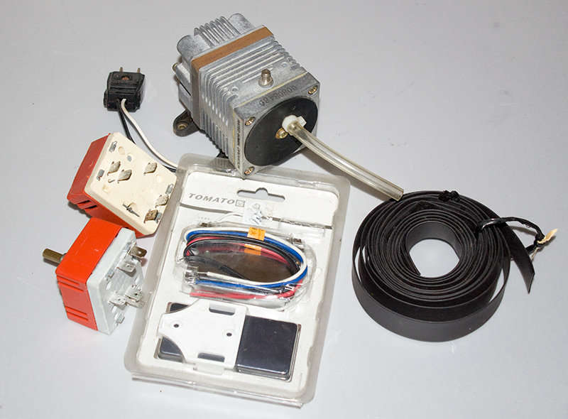 Electrical Job lot  vacuum pump, thermostats , remote switch ** All for one bid **