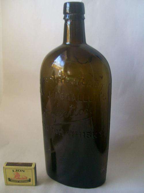 IMPERIAL QUART D&J Mc CULLUMS  SCOTCH WHISKY BOTTLE