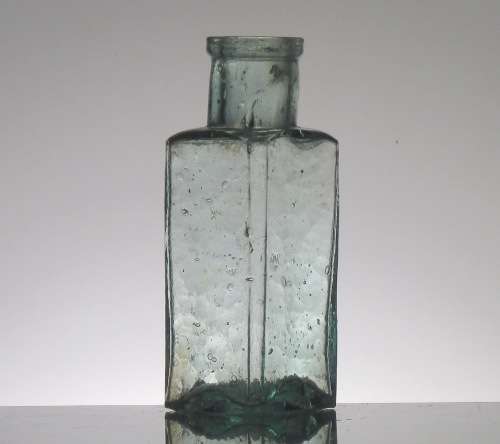 ANTIQUE STRAW HAT POLISH BOTTLE