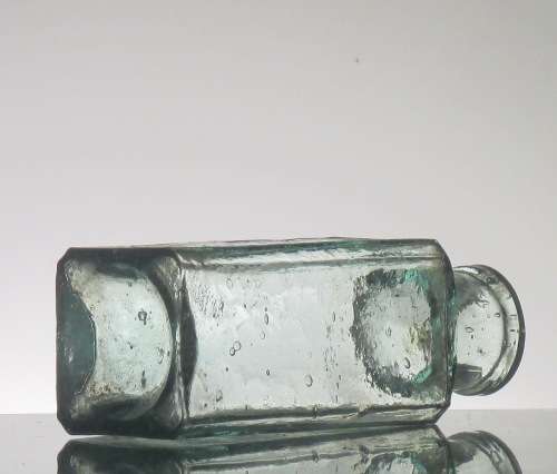 ANTIQUE STRAW HAT POLISH BOTTLE