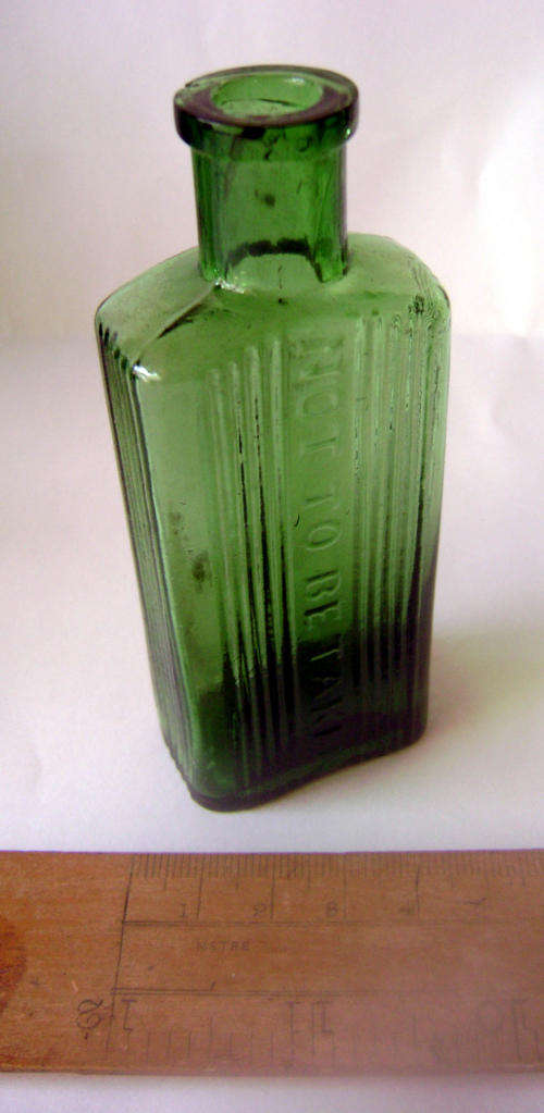 Not To Be Taken Green Glass Bottle