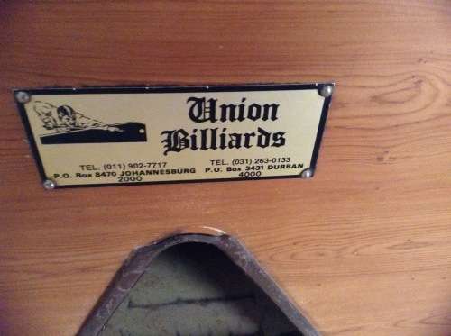 Coin operated pool table