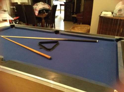 Coin operated pool table