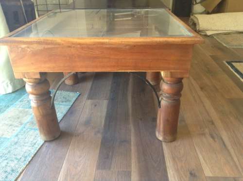 Old Indian door side table with glass insert
