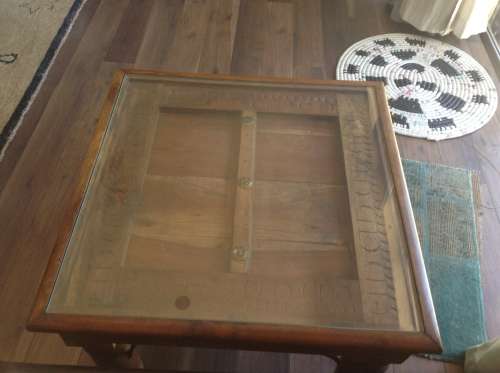 Old Indian door side table with glass insert