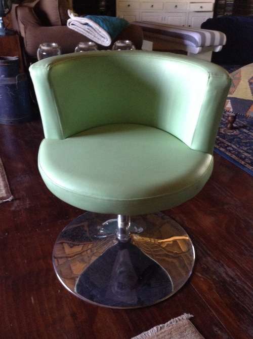 Funky retro lime green swiveling tube chair