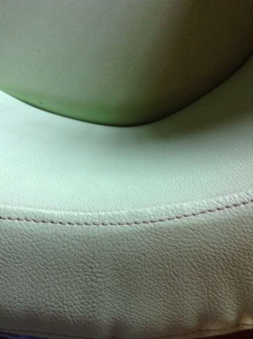 Funky retro lime green swiveling tube chair