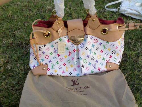 Stunning New with original tag White  with Muliticoloured symbols gold buckle chain leather straps