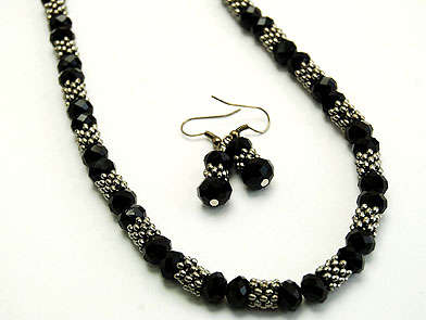 New Arrival - Swarovski Crystals witih silver detail Necklace and Earring Set