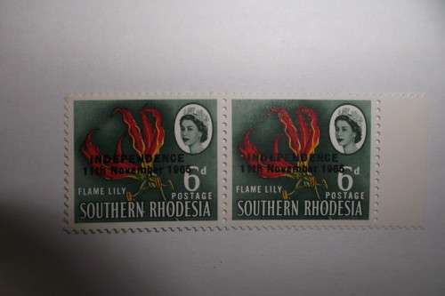 **Variety** 1965 Southern Rhodesia 6d independence overprint MNH with white dot. See belo