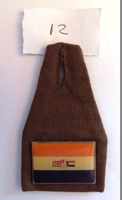COLLECTABLE OLD ARMY SHOULDER FLASH WITH SA FLAG BADGE